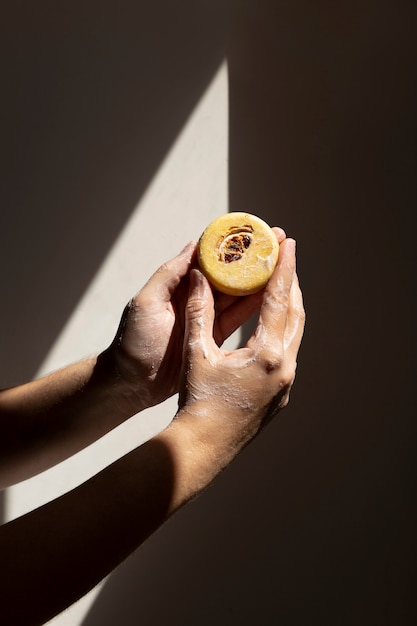 Free Photo caucasian person washing hands with soap