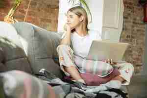 Free photo caucasian woman freelancer during the work in home office while quarantine