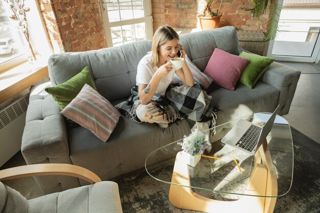 Caucasian woman freelancer during the work in home office while quarantine