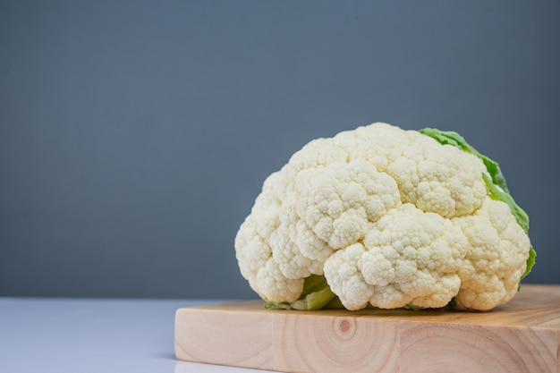 Cauliflower on the wooden floor.