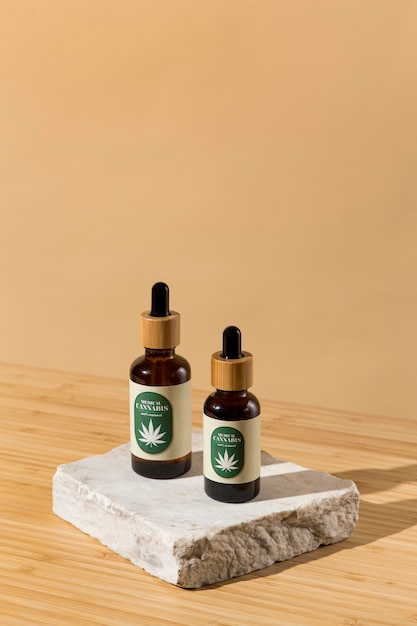 Free Photo cbd oil dropper arrangement