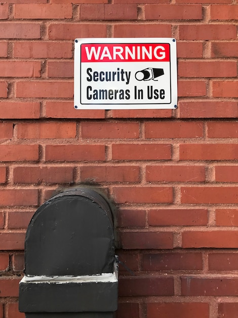 Free photo cctv cameras in use sign