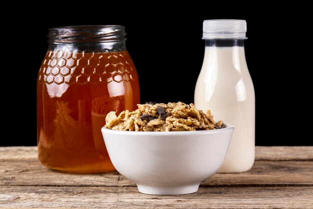 Cereal breakfast with honey and milk