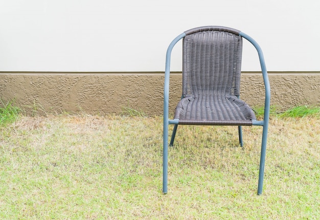 Free photo chair with empty wall