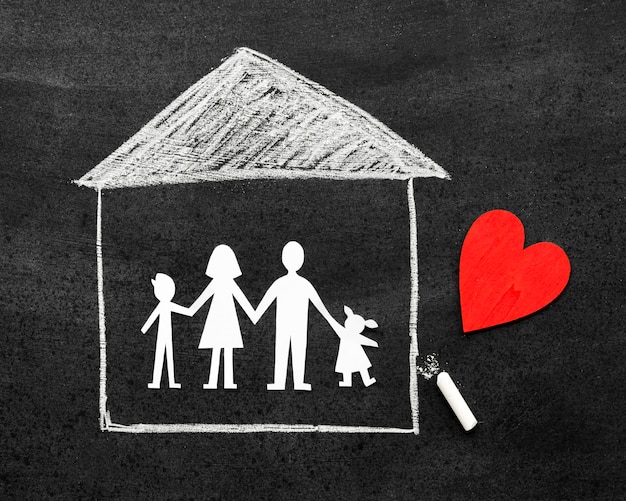 Free photo chalk family concept drawn on blackboard with a red heart