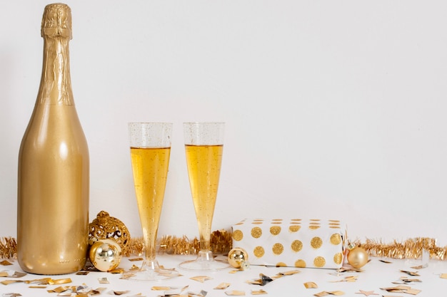 Champagne bottle glasses  and decoration with copy space