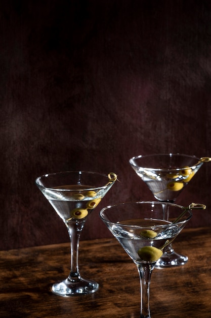 Free Photo champagne glasses with olives