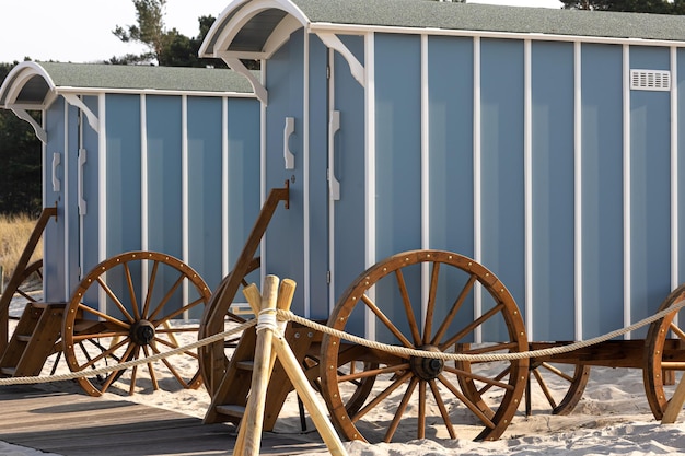 Changing carriages on the sandy beach vintage vans