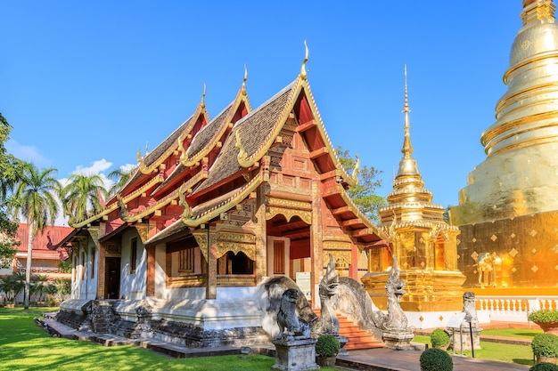 Chapel and golden pagoda at Wat Phra Singh Woramahawihan in Chiang Mai North of Thailand