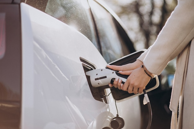 Free photo charger charging electro car close up