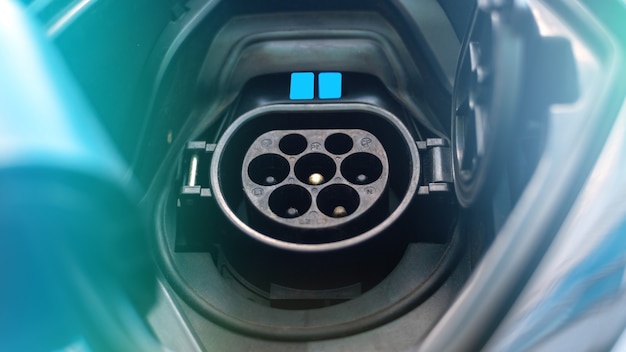 Charging socket of an electric car with blue light