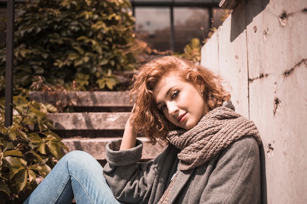 Free photo charming redhead woman in scarf