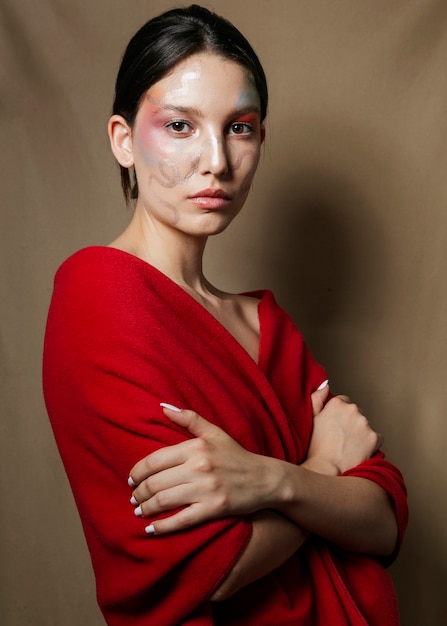 Free Photo charming woman posing with arms crossed