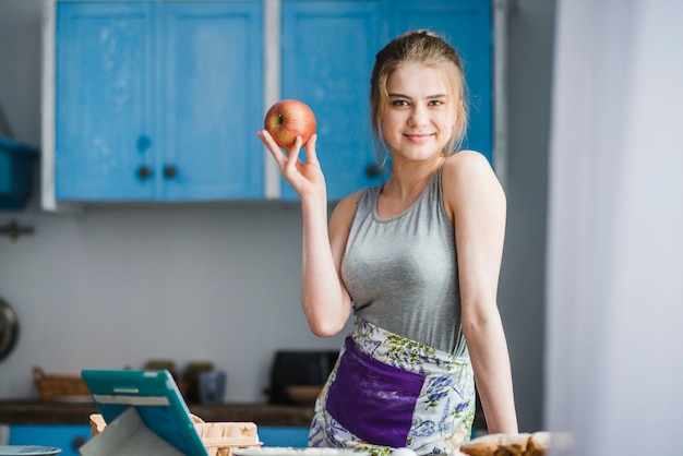 Free photo charming woman with apple