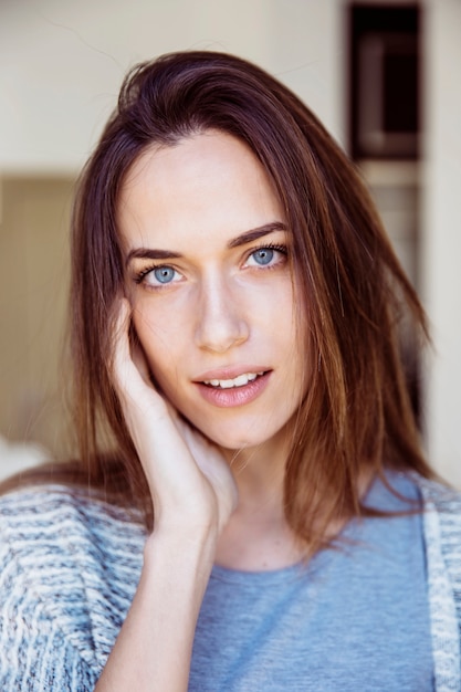 Charming woman with blue eyes