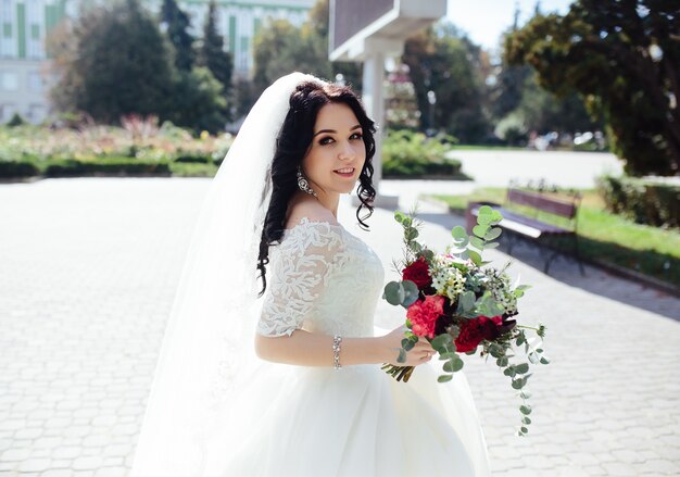 Charming woman with bouquet