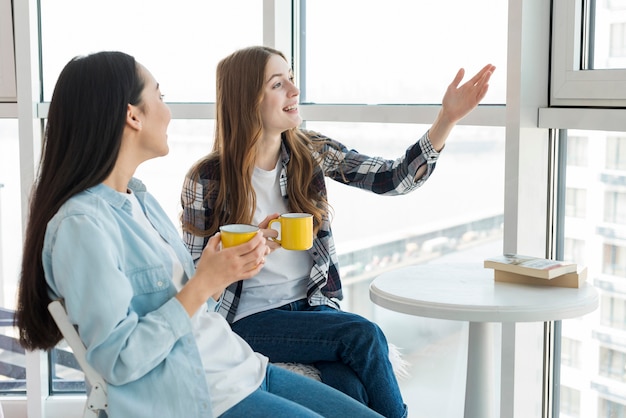 Chatting friends for cup of tea