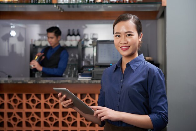 Cheerful bar owner