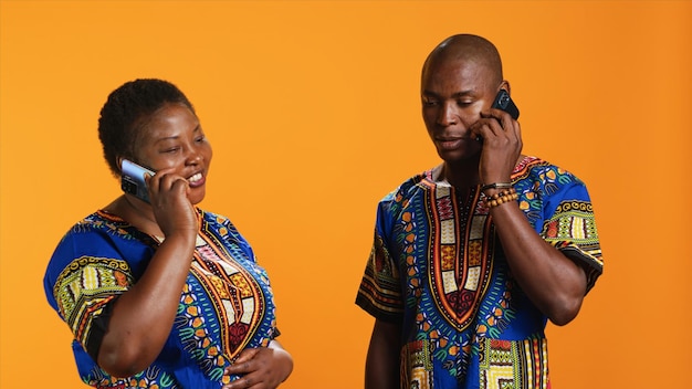 Free Photo cheerful couple talking to family on phone call