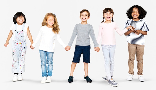 Cheerful diverse kids holding hands