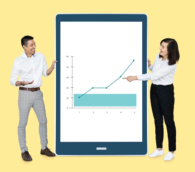 Free photo cheerful diverse people showing a graph on a tablet