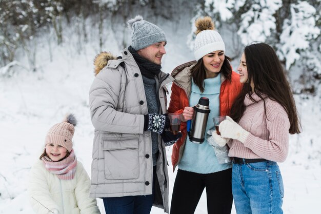 Cheerful family speaking in nature