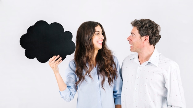 Free photo cheerful father and daughter with speech bubble