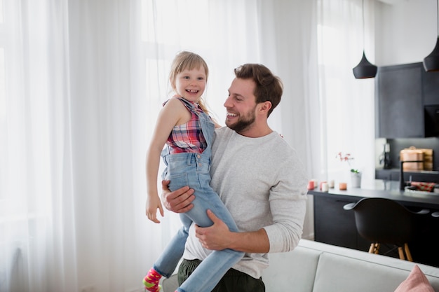 Cheerful father with daughter