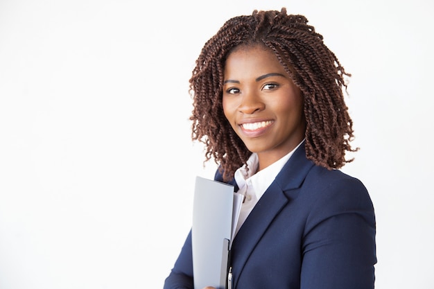 Cheerful friendly job candidate holding documents