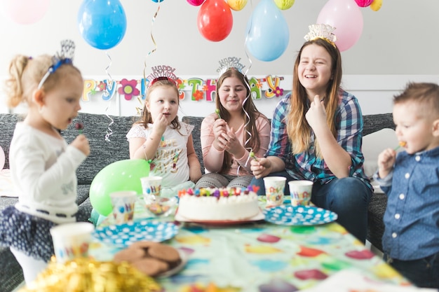 Cheerful guests on birthday party