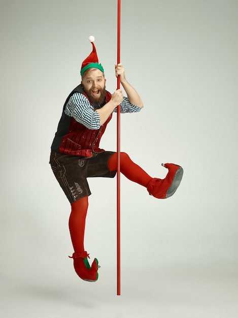 Free photo cheerful man in elf costume