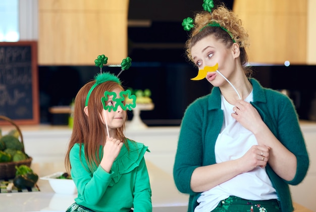 Cheerful mother and daughter enjoying together