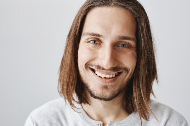 Cheerful smiling bearded man laughing