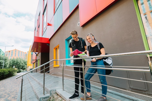 Free Photo cheerful students posing in college