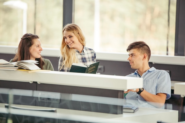 Free photo cheerful students with books