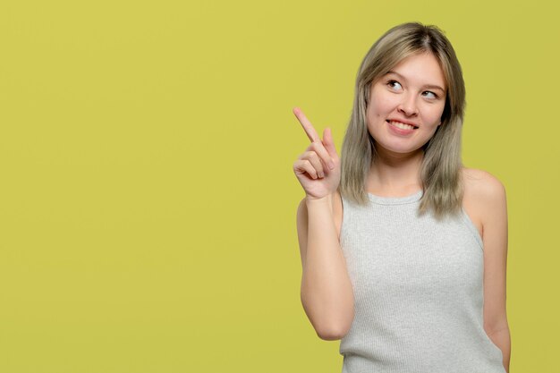 Cheerful woman in a beige tank top