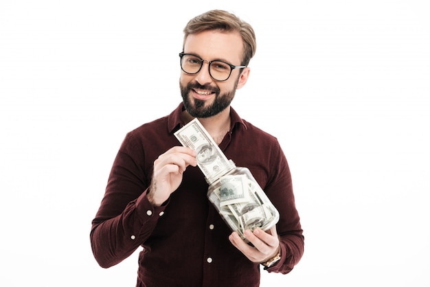 Free photo cheerful young man standing isolated