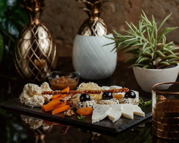 Free photo cheese board with wide selection of foods.