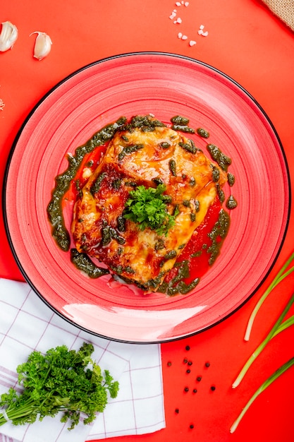 Cheese casserole topped with herbs _