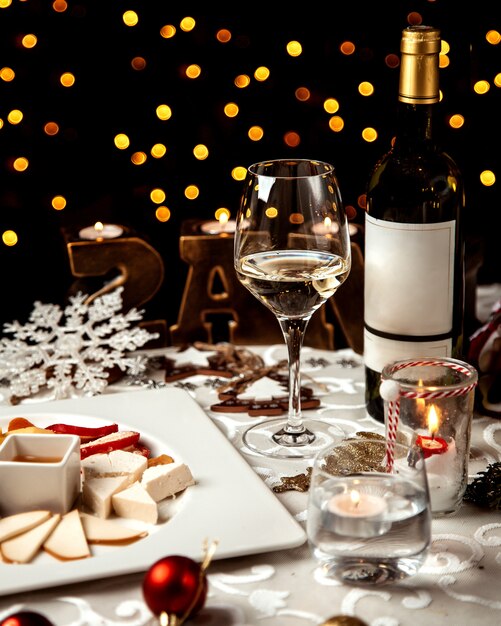 Cheese plate and glass of white wine