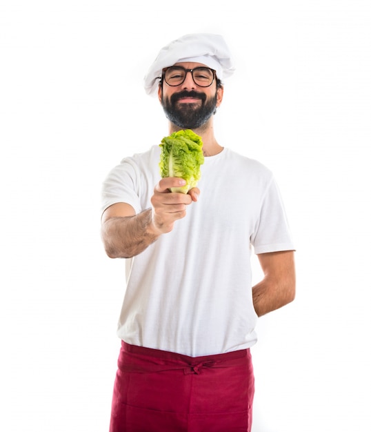 Chef holding a lettuce