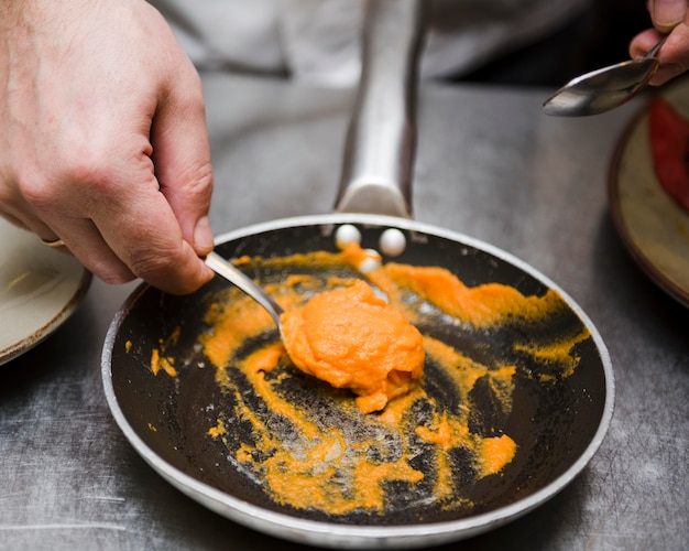 Chef preparing sauce