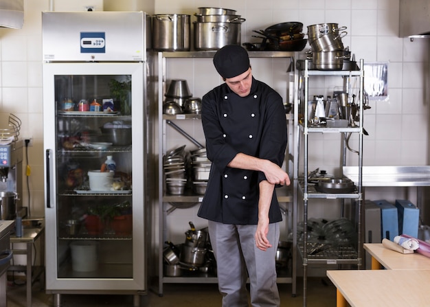 Chef with uniform and utensil kitchen