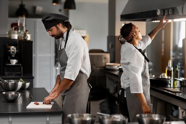 Chef working together in a professional kitchen