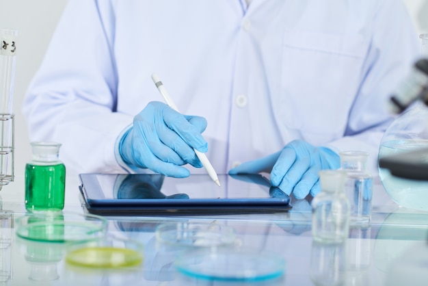 Chemist using touchpad