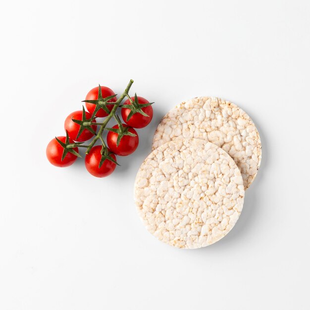 Cherry tomato fruit snack on rice cakes