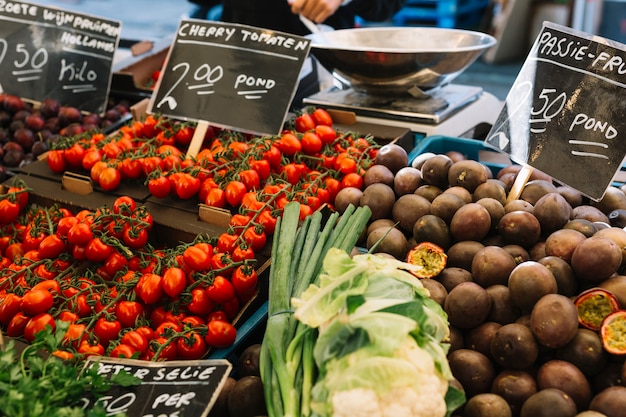 Cherry tomatoes; passion fruits in the farm market