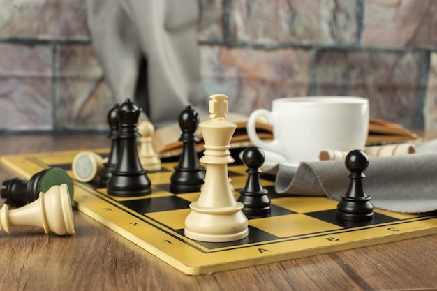 Chess figures on a chessboard, horizontal view