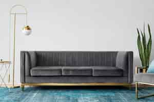 Free photo chic mid-century modern luxury aesthetics living room with gray velvet couch and blue rug