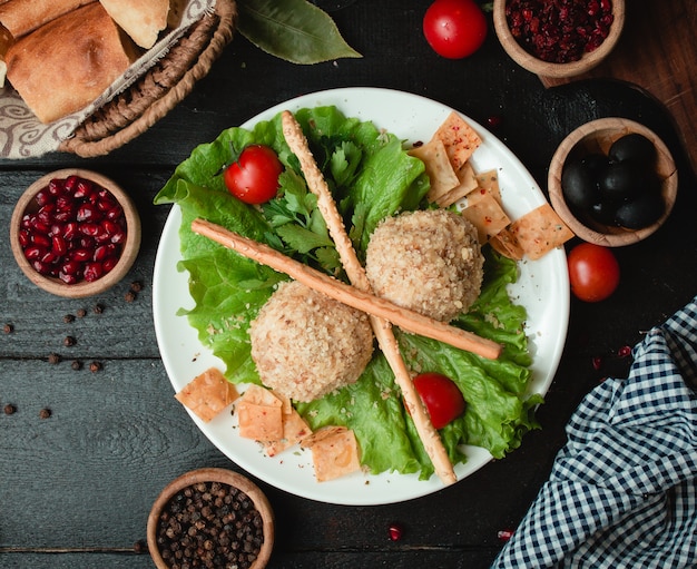 chicken balls with nuts and vegetables